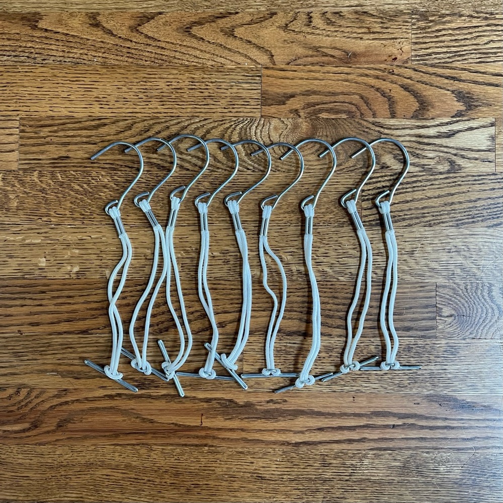 29 x white patternmaking pattern hooks w/ white cords (O/S)